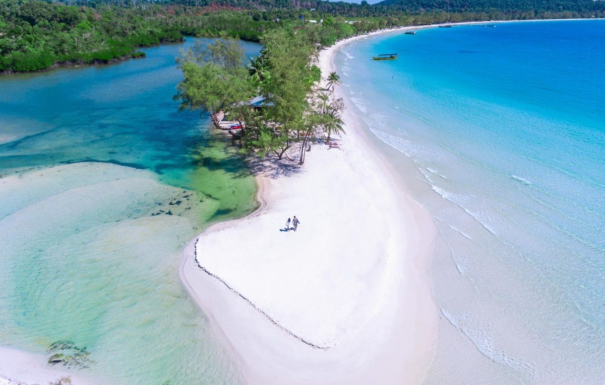beach trees boats people koh rong cambodia